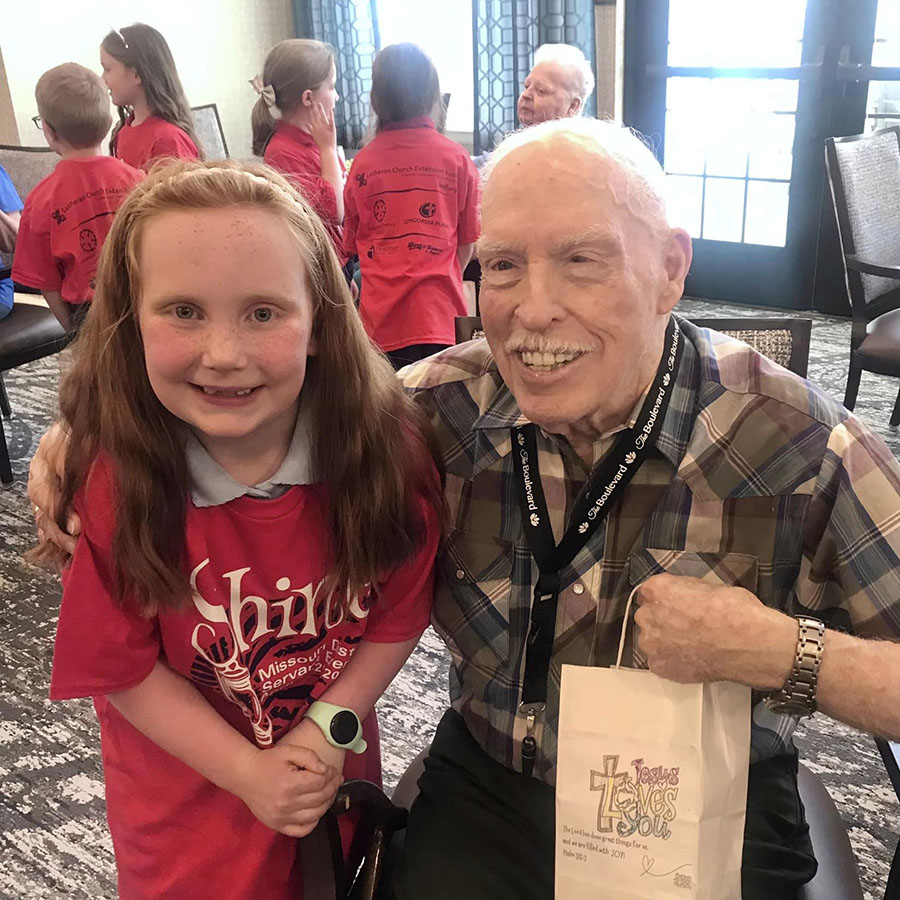 Children from first-grade visit and spend time with the senior living community.